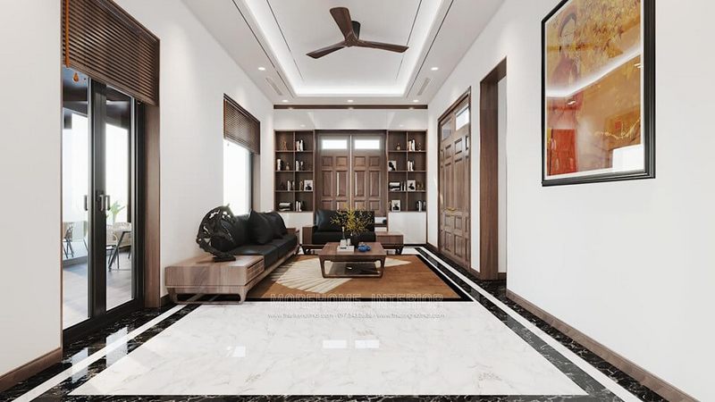 Nội thất gỗ óc chó được thiết kế để tạo nên không gian tiếp khách sang trọng và hiện đại cho phòng khách nhà phố.